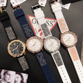 Guess Swirl Quartz Silver Dial White Silicone Strap Watch for Women - W1096L1