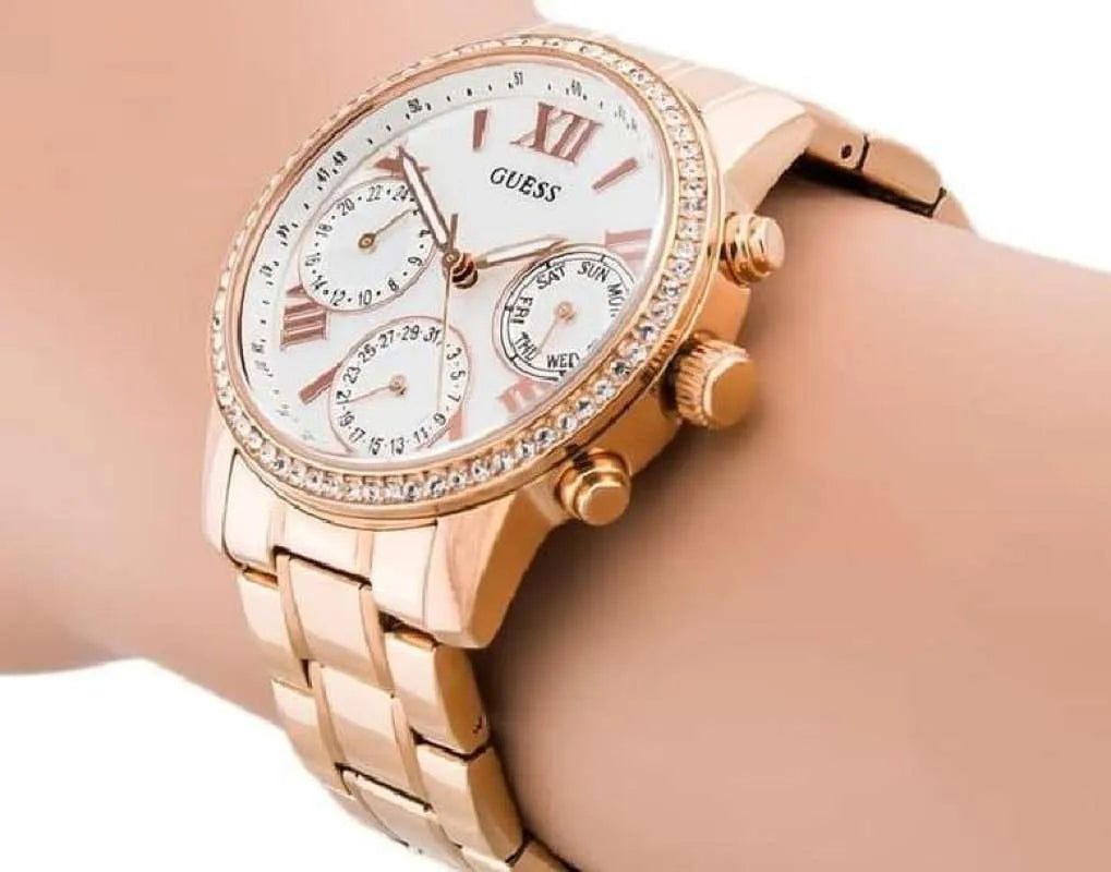 Guess Mini Surprise Analog Silver Dial Rose Gold Steel Strap Watch For Women - W0623L2