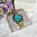 Michael Kors Lexington Chronograph Sky Blue Dial Gold Steel Strap Watch For Women - MK7216