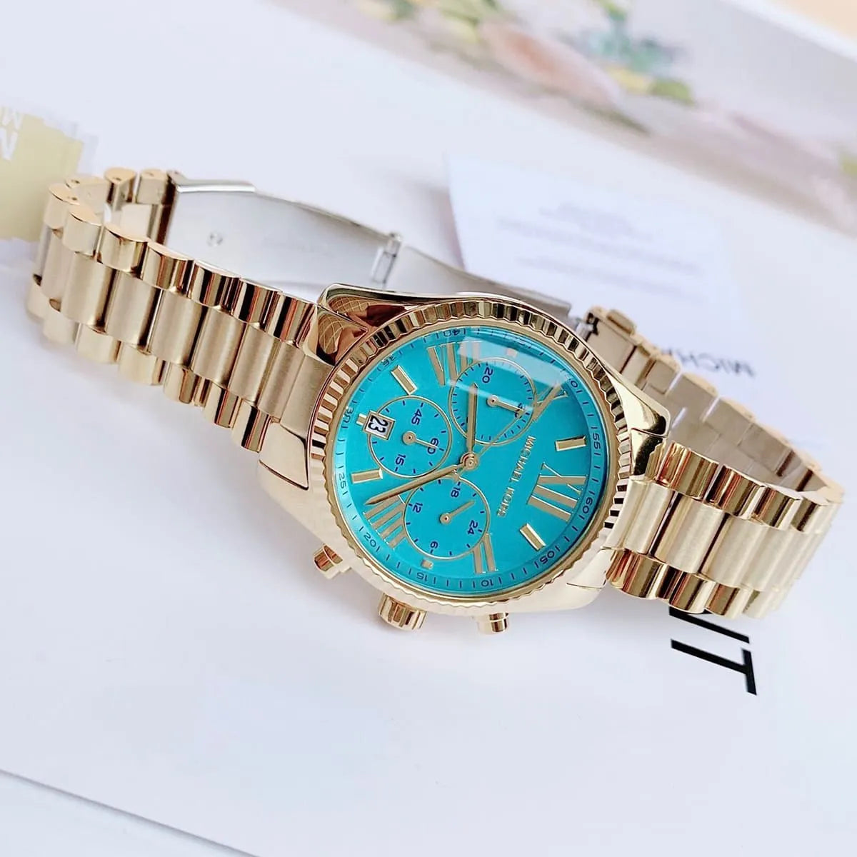 Michael Kors Lexington Chronograph Sky Blue Dial Gold Steel Strap Watch For Women - MK7216