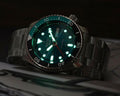 Seiko 5 Sports SKX Skeleton Green Dial Silver Steel Strap Watch For Men - SRPJ45K1