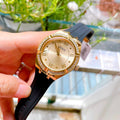 Guess Cosmo Diamonds Gold Dial Black Rubber Strap Watch for Women - GW0034L1