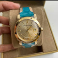 Burberry The City Gold Dial Turquoise Leather Strap Watch for Women - BU9018