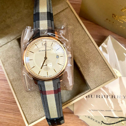 Burberry The Classic Round Gold Dial Brown Leather Strap Unisex Watch - BU10001