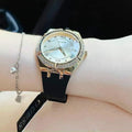 Guess Cosmo Diamonds Gold Dial Black Rubber Strap Watch for Women - GW0034L1