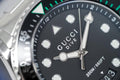 Gucci Dive Quartz Black Dial Silver Steel Strap Watch For Men - YA136208