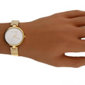 Calvin Klein Authentic Silver Dial Gold Steel Strap Watch for Women - K8G23546