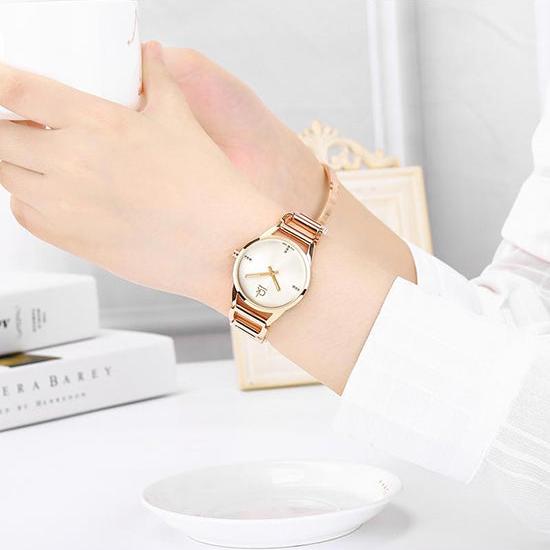 Calvin Klein Stately White Dial Gold Steel Strap Watch for Women - K3G2362W