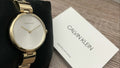 Calvin Klein Authentic Silver Dial Gold Steel Strap Watch for Women - K8G23546