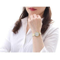 Tissot Flamingo Mother of Pearl Dial Two Tone Steel Strap Watch For Women - T094.210.22.111.01