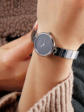 Calvin Klein Authentic Black Dial Silver Steel Strap Watch for Women - K8G23141